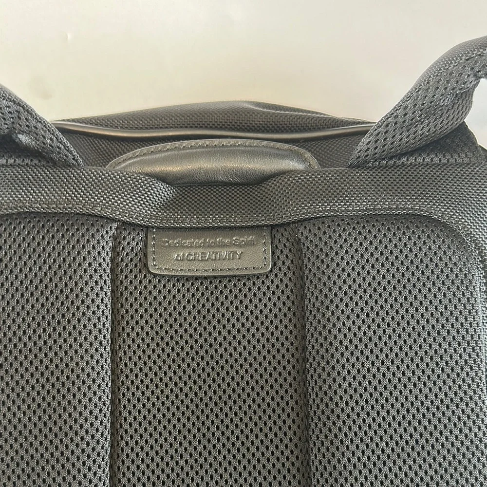 Tumi Black Backpack with Structured Design